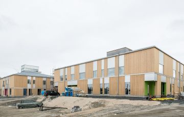 Tuupalan kyläkoulun on suunnitellut arkkitehti Antti Karsikas.  